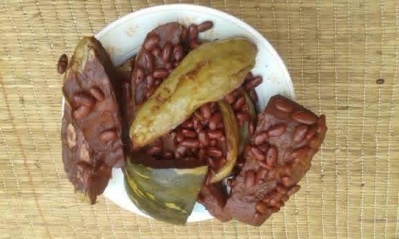Traditional Ugandan meal with beans and local staples